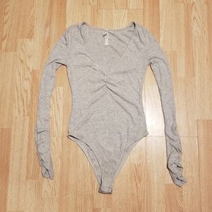 Free people cozy up with me grey bodysuit